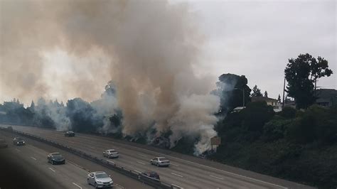 Vegetation fire threatens homes in East Oakland